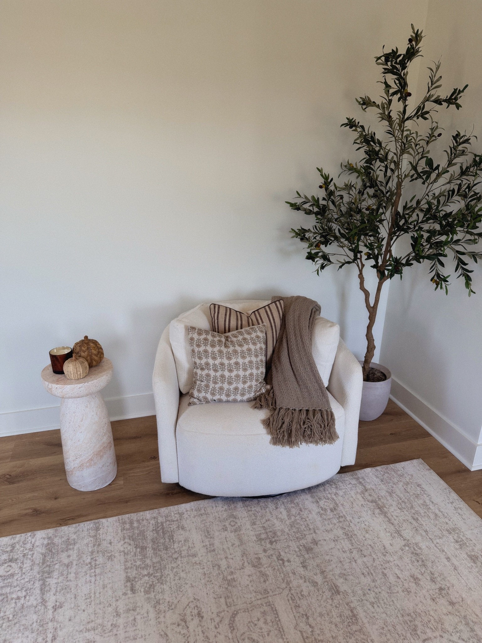 A little Fall refresh in my content filming room 🍂 The olive tree is one of my best sellers from Amazon + I’ve had the swivel chair for a couple years from Walmart and it’s great quality! Added some Fall colored pillows, a cozy throw blanket, pumpkin decor and a fall candle 🕯️

#LTKdayinmylife #LTKSeasonal #LTKHome