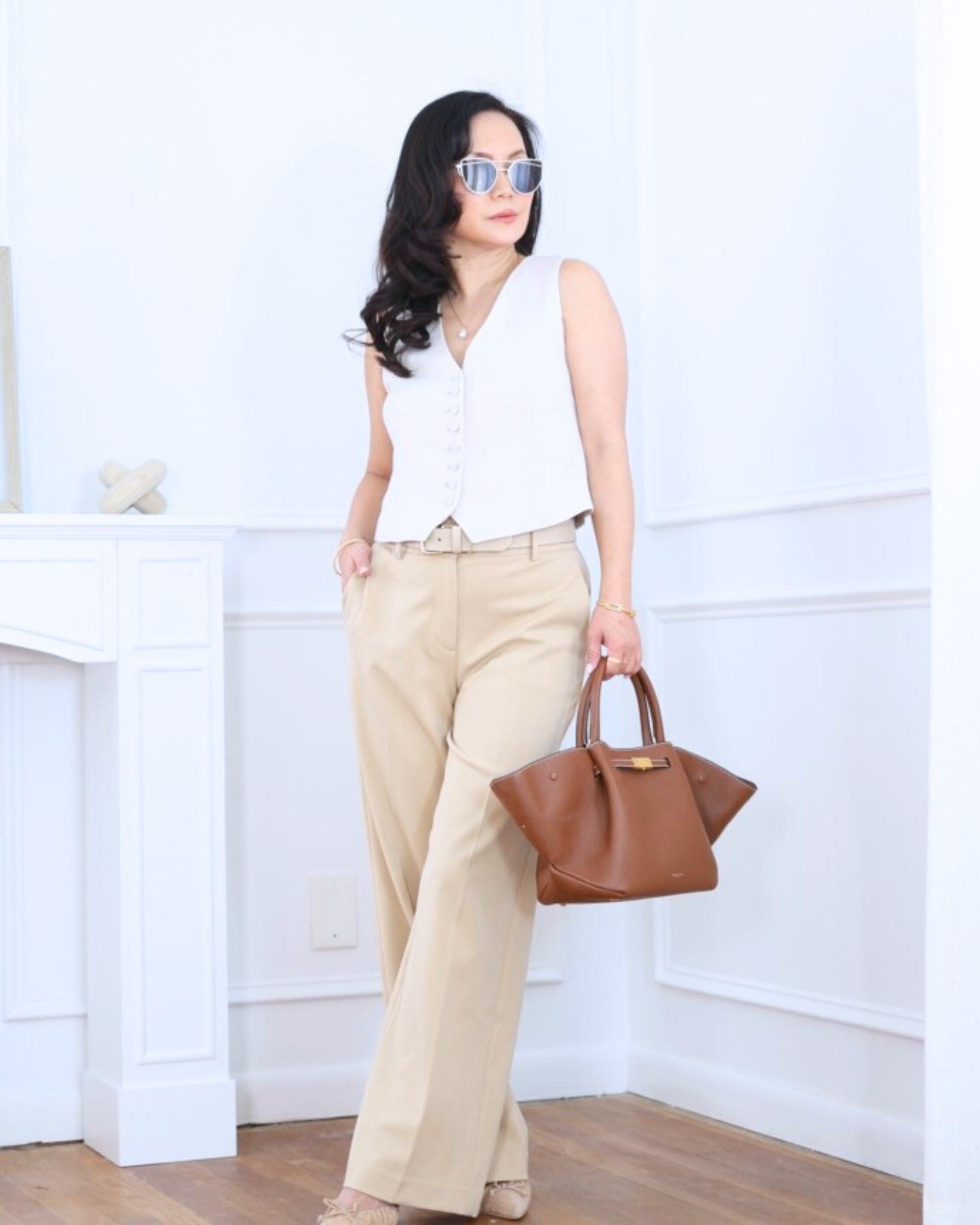 Clean and polished with a modern feel — this crepe vest from Quince paired with wide-leg pants from Ann Taylor is such an easy way to look put together without trying too hard. I’m 5’2, wearing size XS.

#LTKOver40 #LTKootd #LTKPetite