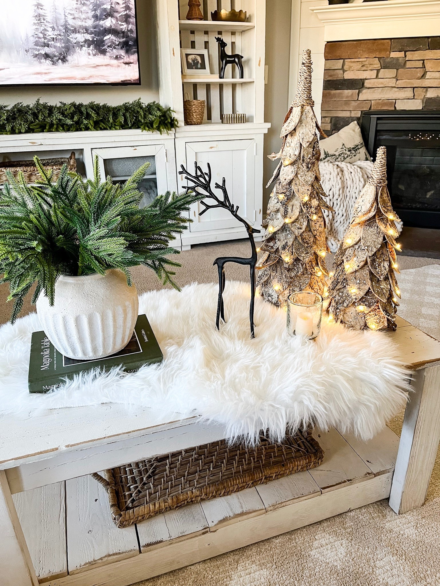 Coffee table styling !
Follow @lifeinmyarizonahome on Instagram for more holiday ideas and inspiration. 

I’m showing a winter/Christmas coffee table styling idea with these beautiful lit birch trees. I’m so impressed with these and I’m excited to use them in my holiday decor this season!  They have such beautiful detail and I love how they light up and can be set on a timer.  A furry rug, black reindeer, a glass hammered votive holder, and these Norfolk stems all help complete the look!

#christmasdecor #holidaydecor #litbirchtree #coffeetable #coffeetabledecor #homedecor #coffeetablestyling #wintercoffeetable 


#LTKHoliday #LTKSeasonal #LTKHome