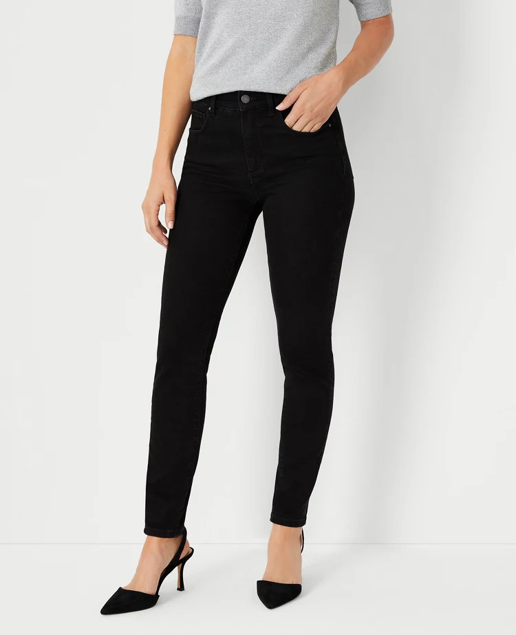 Petite Sculpting Pocket Mid Rise Skinny Jeans in Jet Black Wash | Ann Taylor (US)