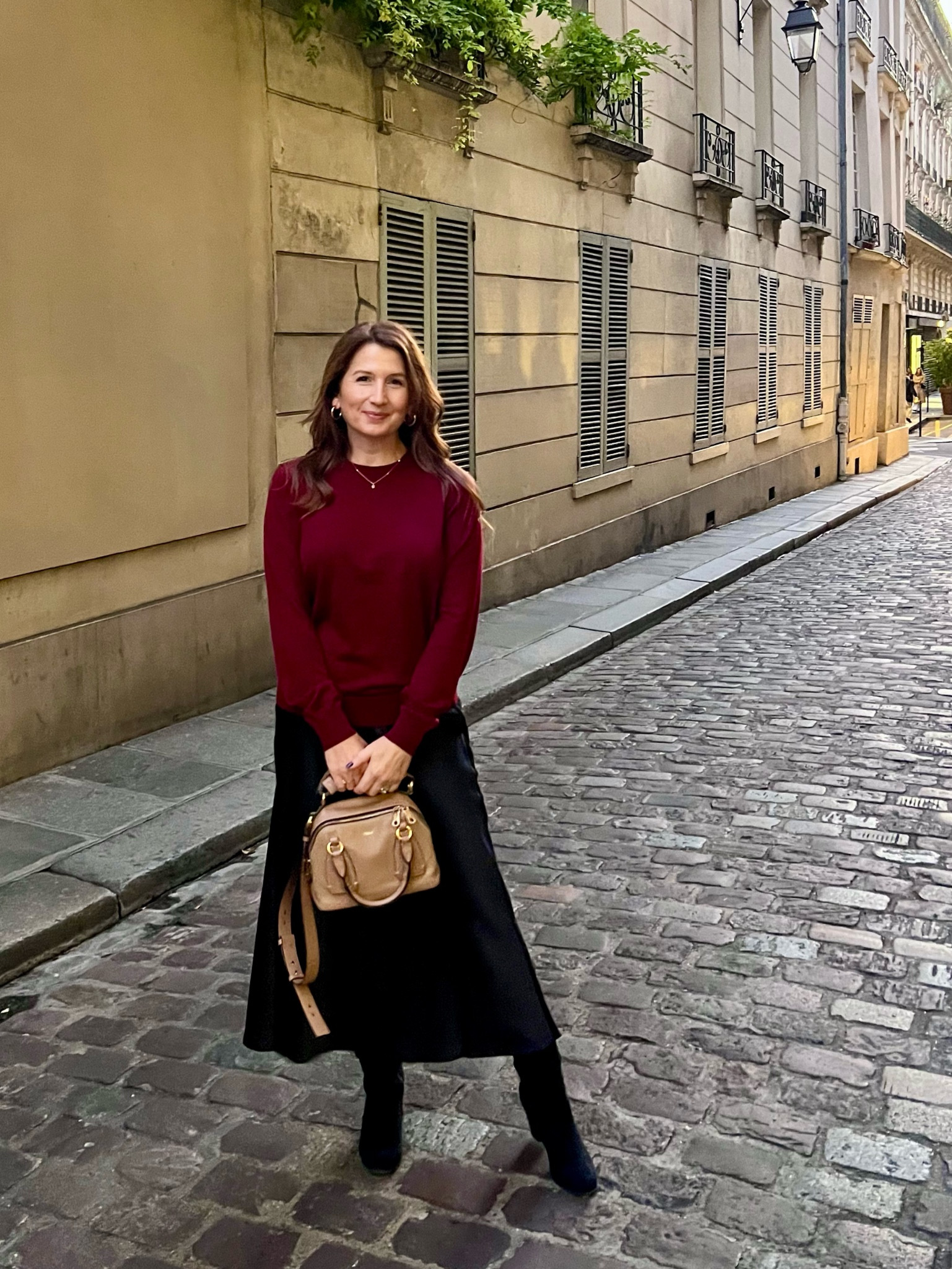 Date night in Paris outfit of black satin maxi skirt, burgundy merino sweater, knee high black heeled boots and neutral leather Chloe bag. #paris #parisoutfit 

#LTKstyletip #LTKeurope #LTKover40