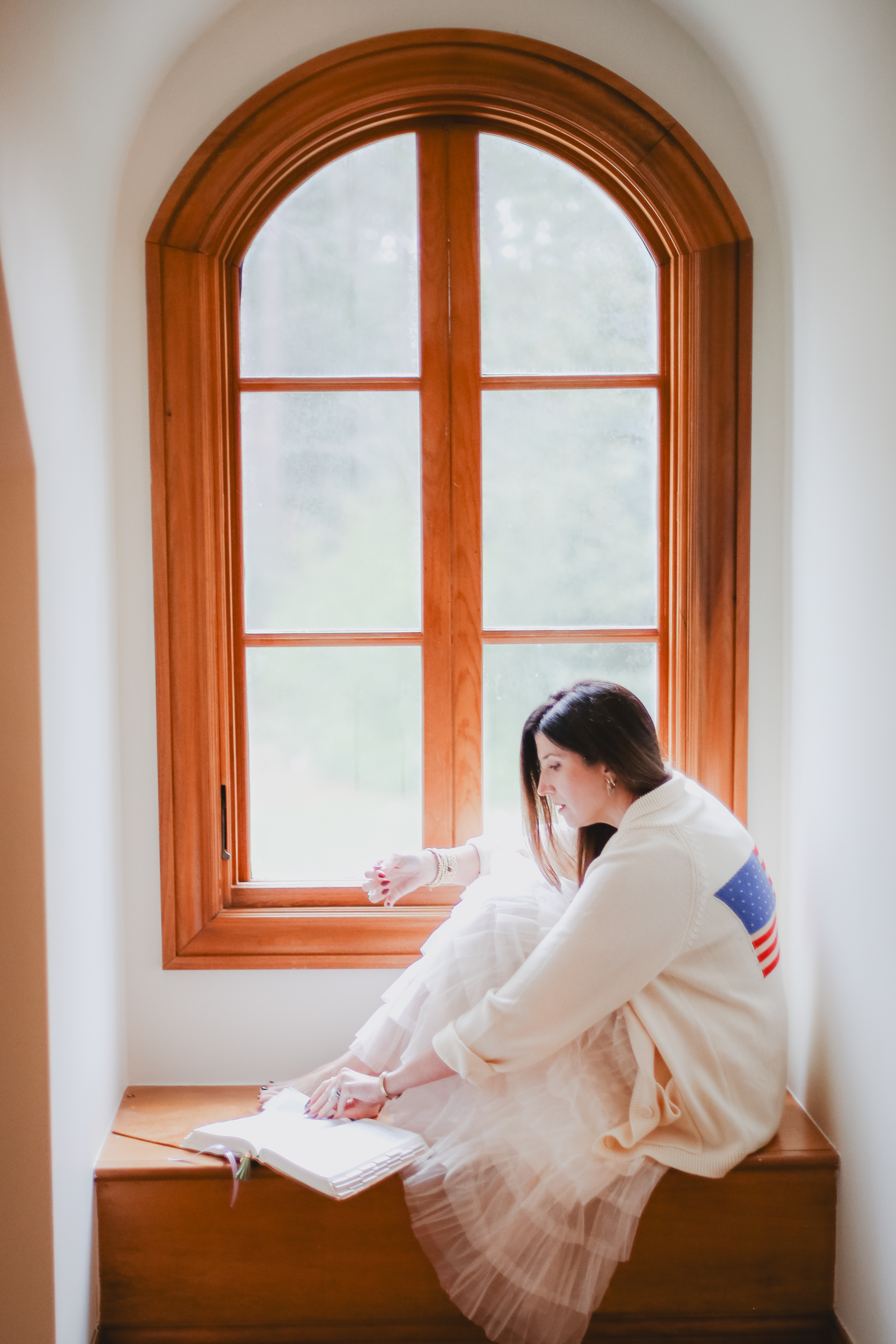 Love a skirt/ sweater/ book combo.  

 #LTKootd #LTKOver40 #LTKHome
