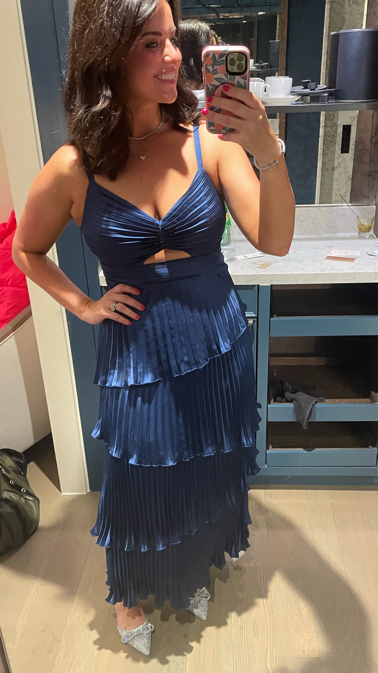 This dress is so fun! It’s unexpected with the cutout and flirty with the pleats and tiered skirt! 

