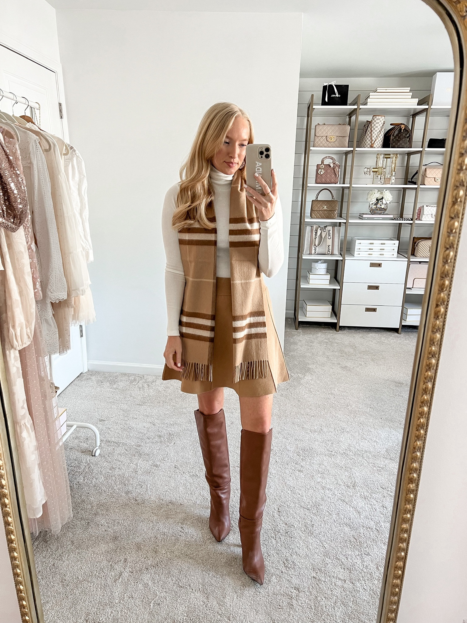 Simple neutral outfit to wear for the winter. Complete any look with this Burberry scarf!

#LTKHoliday #LTKstyletip #LTKSeasonal