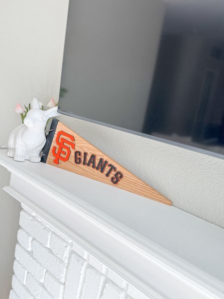 Also madly in love with one of the gifts from my kids…in this bright white and light blue family room, I agree we need a little orange and black. Go Giants!!! 

#LTKHome #LTKFamily #LTKSeasonal