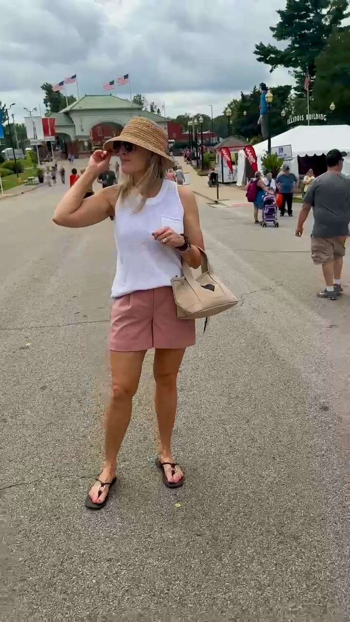 Everyday summer outfit. This easy combination of an Adventura Open Weave Tank, @Varley pink shorts, and my Quilted Koala bag is stylish and kept me comfortable despite the heat. Add sandals, a straw hat, sunglasses and you’re ready to go.

Vacation outfits, summer outfits, outfits with shorts, over 40 fashion, style over 50, festival style, summer staples

#LTKootd #LTKSeasonal #LTKOver40