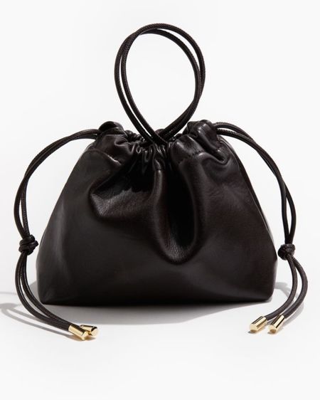 H&M black bag, Loewe flamenco bag 

#LTKeurope #LTKitbag #LTKSeasonal