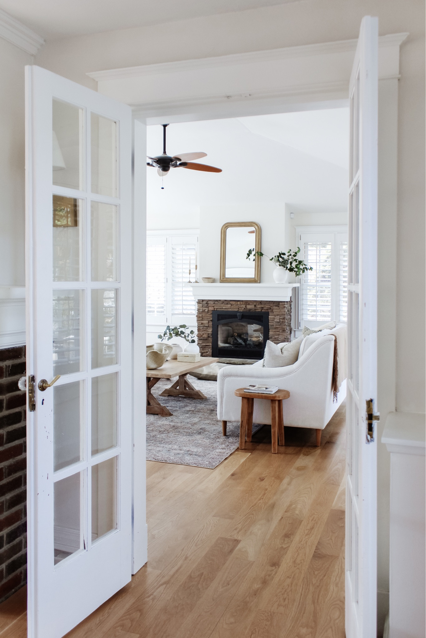 March is a perfect transitional month to set your home & style up for a happy Spring ✨ On the blog, the March Edit is full of new pieces to inspire that change - shop at the link in bio!
•
•
•

 #traditionalhome  #newhomeideas #smmakelifebeautiful #flashesofdelight #homeimprovements #mybhg #homesweethome #cozyhome #livingroominspo #traditionalhomes #flashesofdelight #lightandairy #pillowarrangement #livingroom #livingroomdecor #livingroomstyle #livingroomstyling #coffeetabledecor #coffeetablestyling white sofa, slope arm sofa, traditional sofa, loloi rug, moody living room, neutral living room, gold mirror, fireplace mantel decor, coffee table decor, spring home decor 

#LTKsalealert #LTKhome #LTKunder50