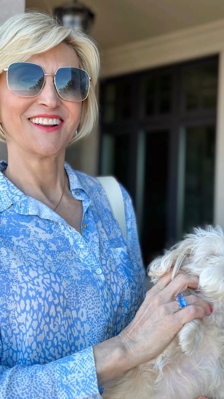 I’m feeling BLUE 💙🩵in the best way thanks to this NEW mini Castle ring 💍 from @deandavidson

It’s the perfect piece of jewelry to wear with this sky blue animal print shirt and light wash @motherdenim jeans. 
 

#LTKSeasonal #LTKover40 #LTKstyletip