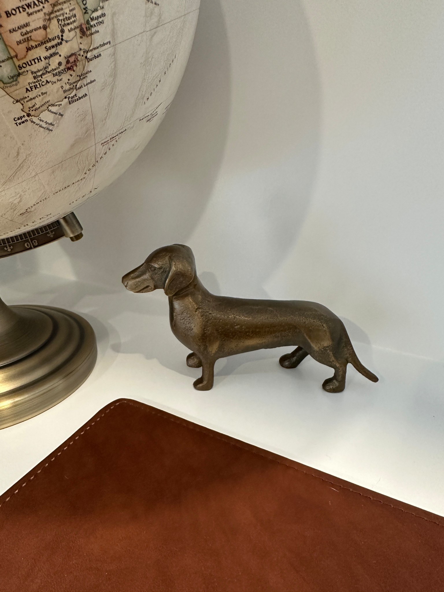 The cutest dachshund figurine ! Very high end for $22 -
From
Anthro!

#LTKHome