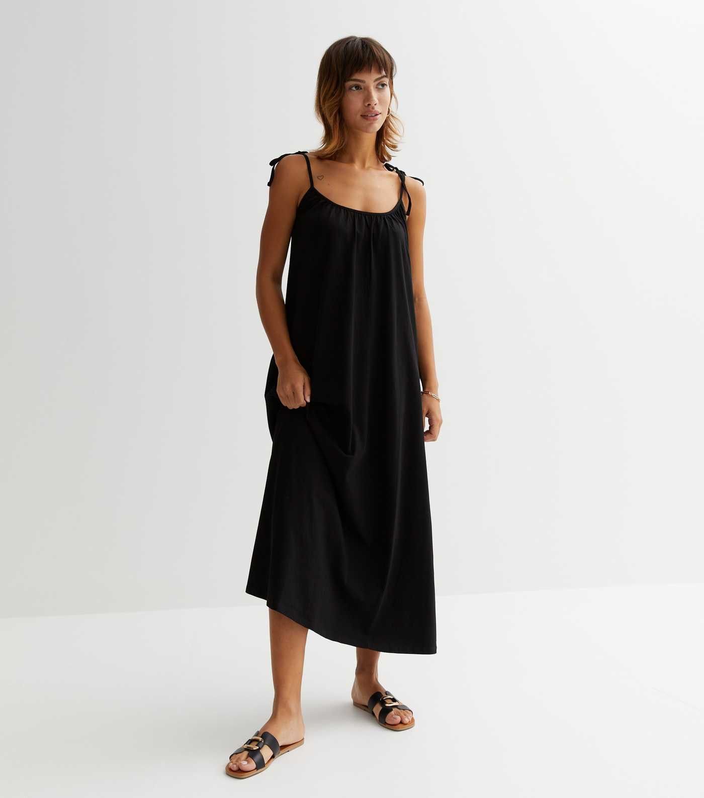 Black Strappy Midi Smock Dress
						
						Add to Saved Items
						Remove from Saved Items | New Look (UK)