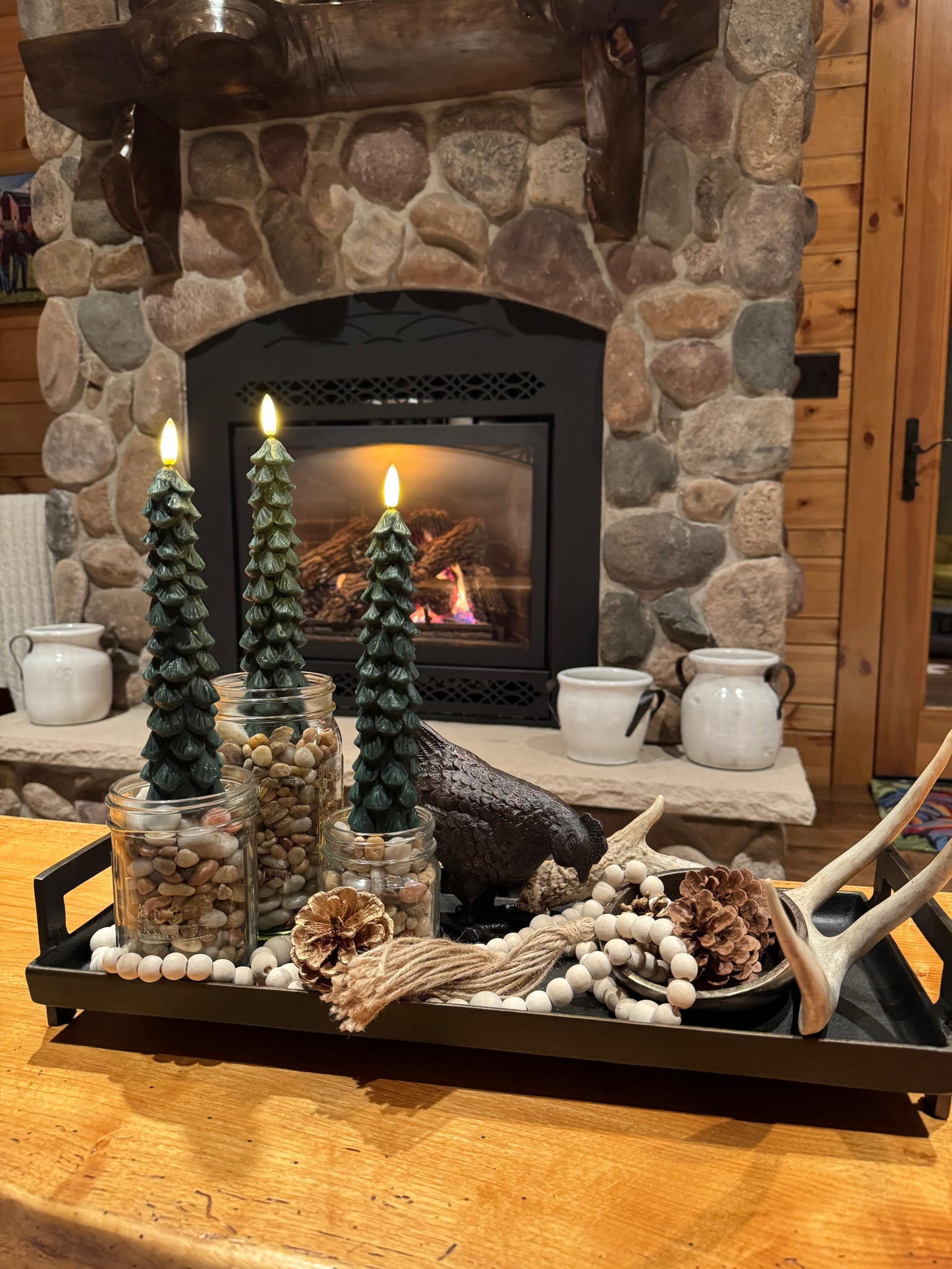 Holiday decor Christmas table display. Love putting together random items to make a fun table situation. These Amazon remote controlled tree candles are darling! 

#LTKSeasonal #LTKHome #LTKHoliday