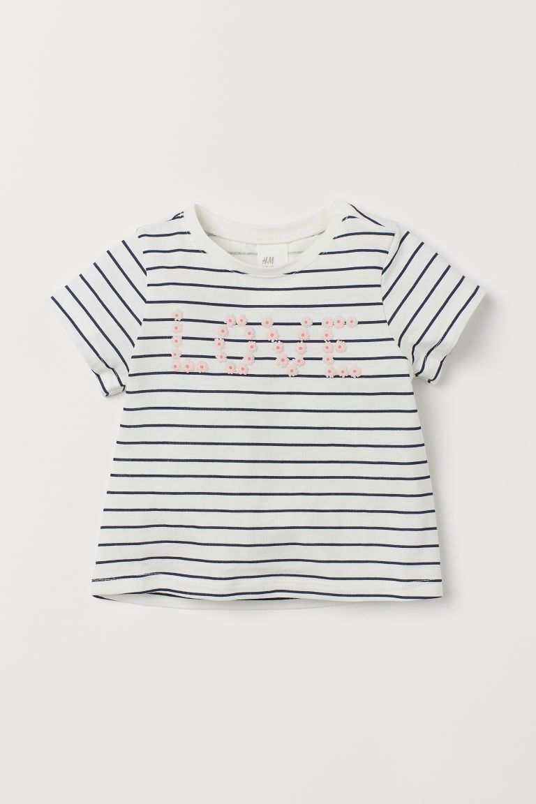 Short-sleeved top in soft cotton jersey with printed pattern. Snap fastener on one shoulder (size... | H&M (US + CA)