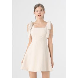 Bowknot Shoulder Crystal Edge Mini Dress in Cream | Chicwish