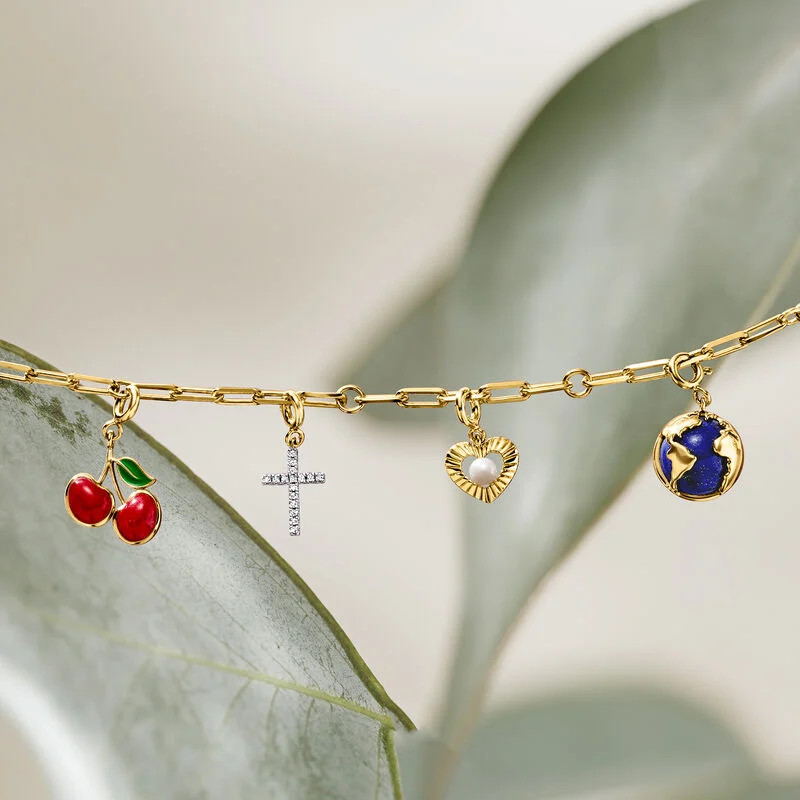 .10 ct. t.w. Diamond Cross Charm in 18kt Gold Over Sterling | Ross-Simons