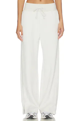 Nike High Waisted Wide Leg Cozy Fleece Pant in Light Bone & Sail from Revolve.com | Revolve Clothing (Global)