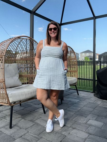 Looks like a dress, but this is actually a romper/skort! It is linen, which is perfect for summer, it runs TTS, it comes in a few color options and the shorts are hidden under the skirt and are attached! This is perfect to throw on and go, all summer long! 

#LTKStyleTip #LTKMidsize #LTKFindsUnder100
