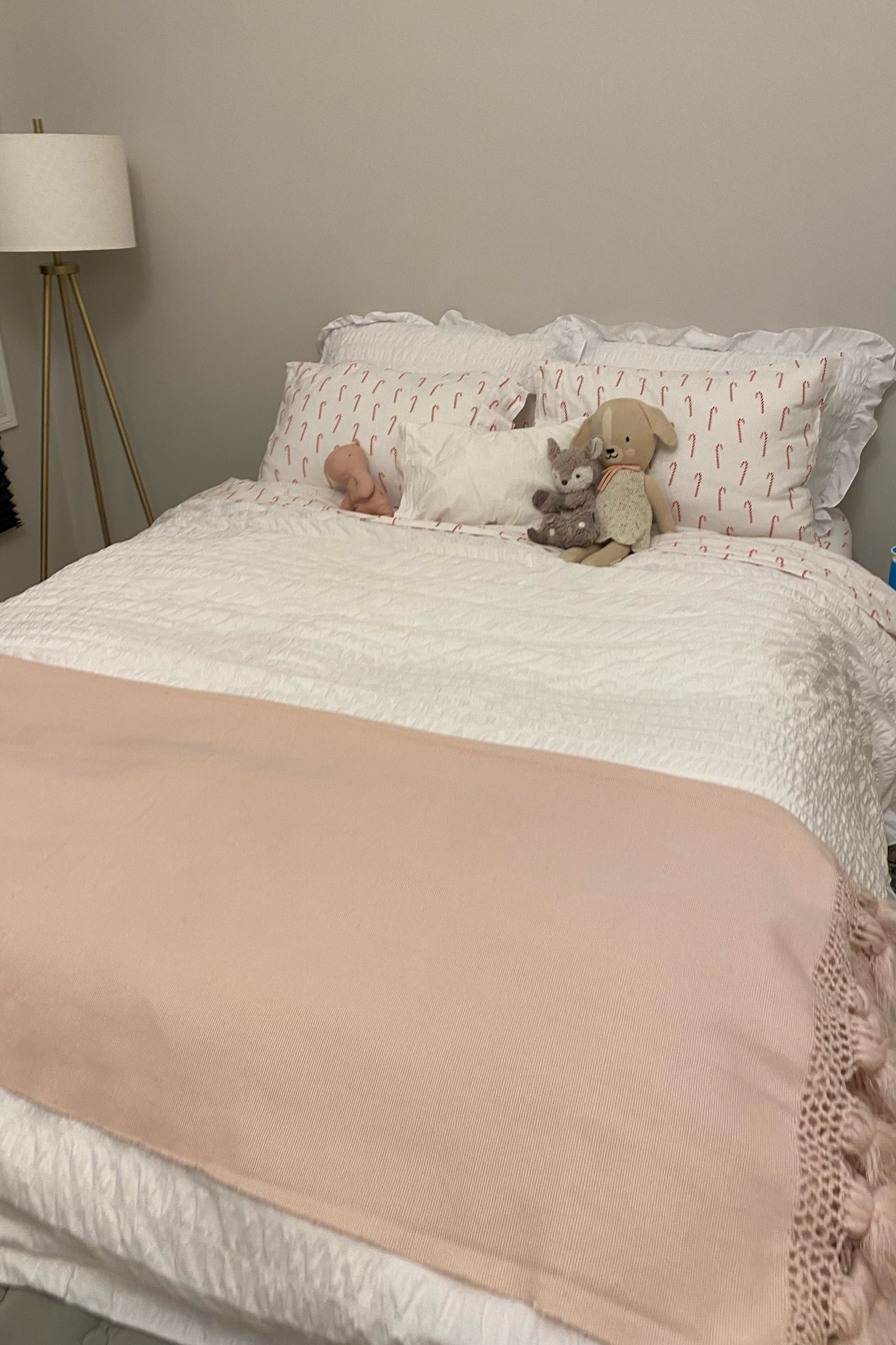 Toddler girl pink Christmas bed with candy cane flannel sheets - so soft!

#LTKkids #LTKhome #LTKHoliday