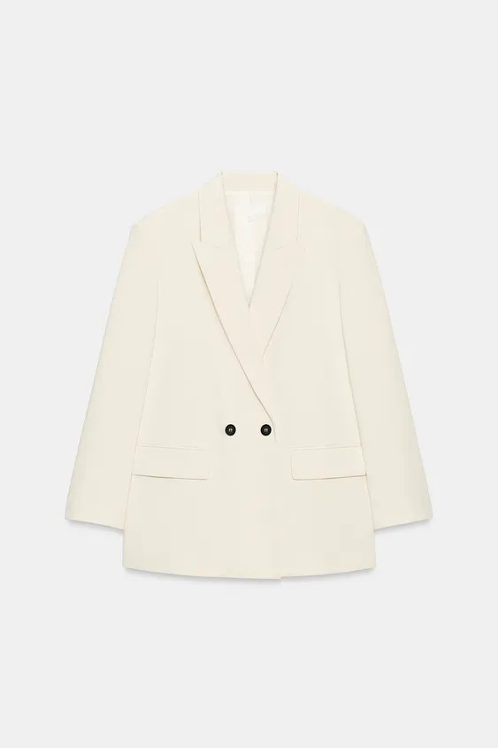 Oversize blazer with a regular collar and long sleeves with shoulder pads. Featuring front flap p... | Zara UK