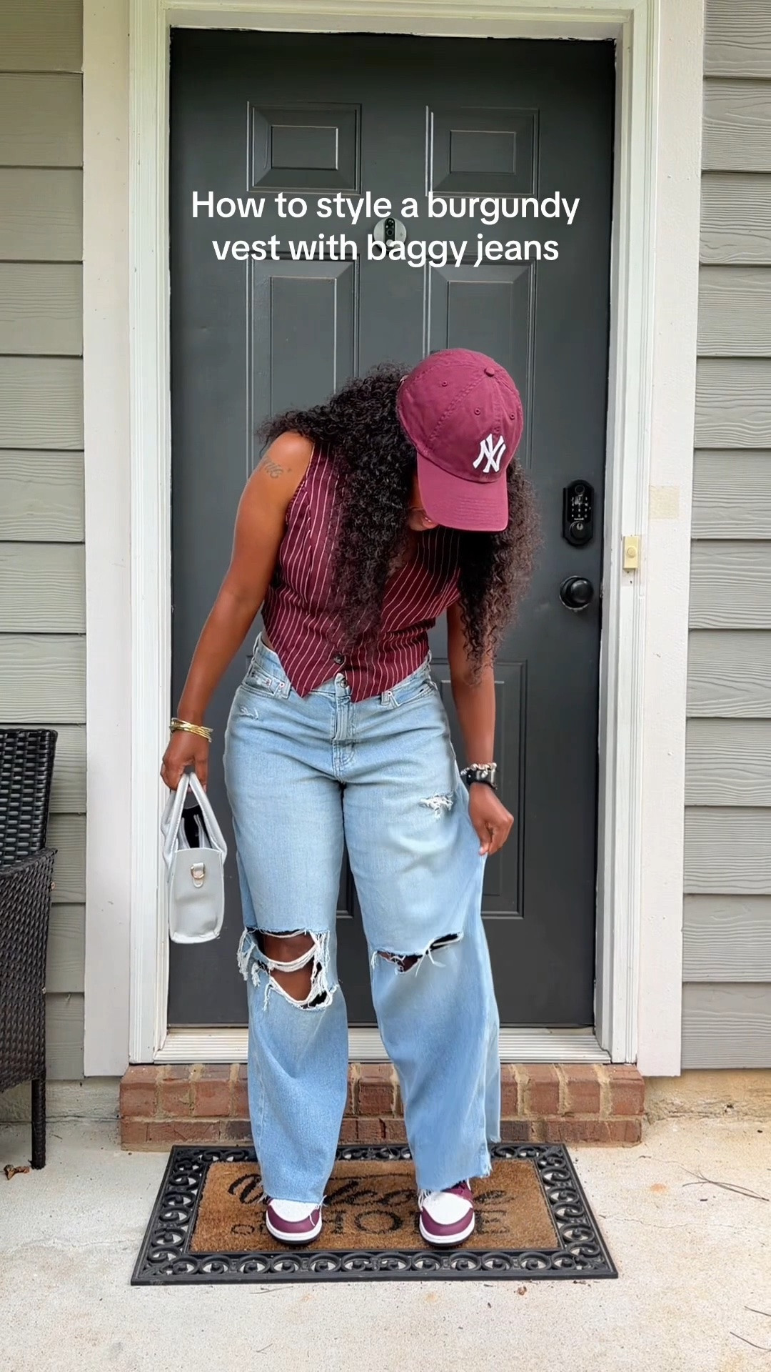 Looking for an easy baggy jeans outfit for fall? Try pairing light wash baggy jeans with a fitted vest, sneakers and a baseball cap for a casual everyday look. This outfit is perfect inspiration if you love relaxed denim, wide leg jeans and comfortable fall outfits you can actually wear.

#LTKootd #LTKOver40 #LTKPetite