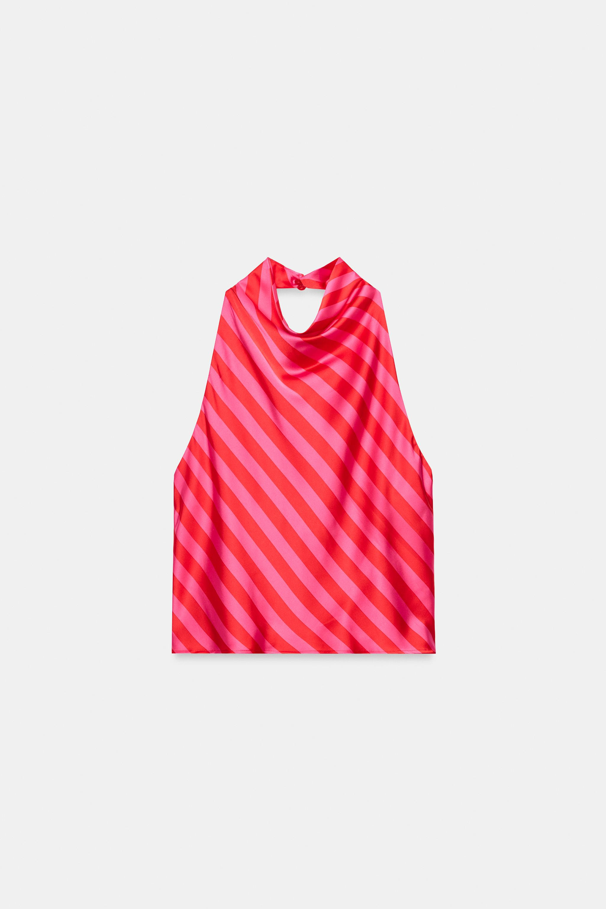Model height: 170 cmHalter neck top with an open back. Back fastening with hidden buttons. | Zara US