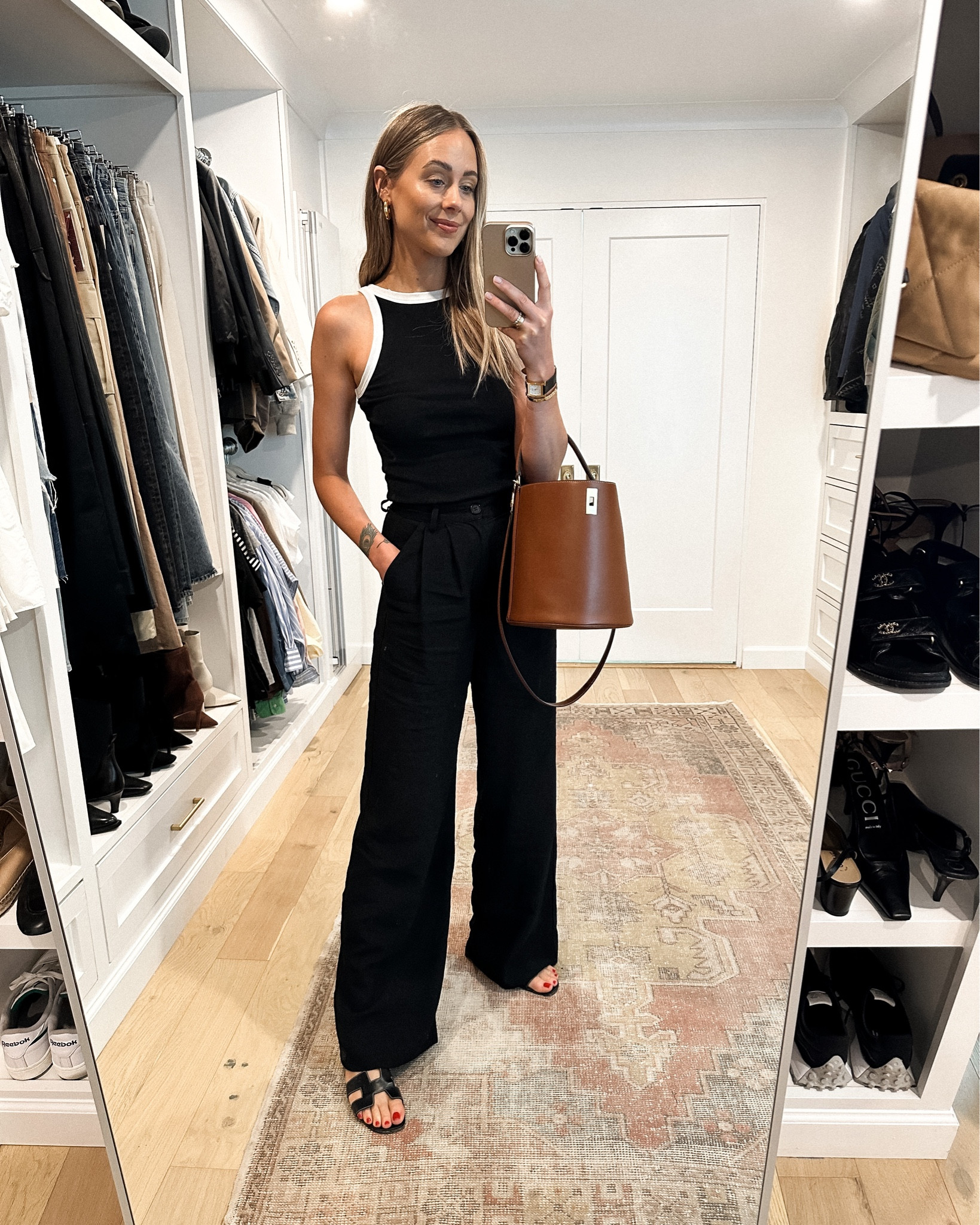 Fashion Jackson wearing black tank (small) wide leg black trousers (small) Hermes sandals (linked similar) Celine bucket bag (linked similar) #fashionjackson #sandals #bucketbag 

#LTKunder100 #LTKstyletip #LTKunder50