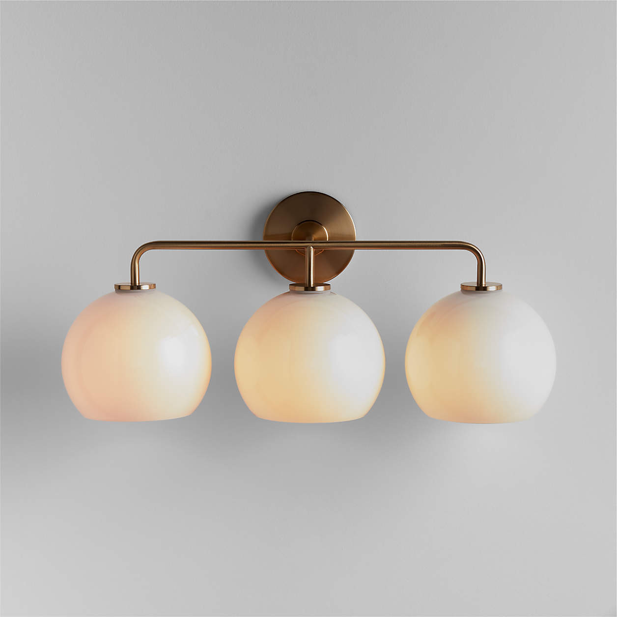 Arren Brass 3-Light Wall Sconce with Milk Round Shades | Crate & Barrel | Crate & Barrel