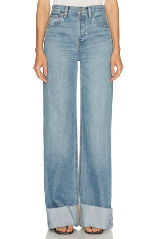 RE/DONE High Rise Wide Leg Cuff Jeans in Vintage Biker Blue - Blue. Size 26 (also in 25, 27, 30, 31, 32). | FWRD 