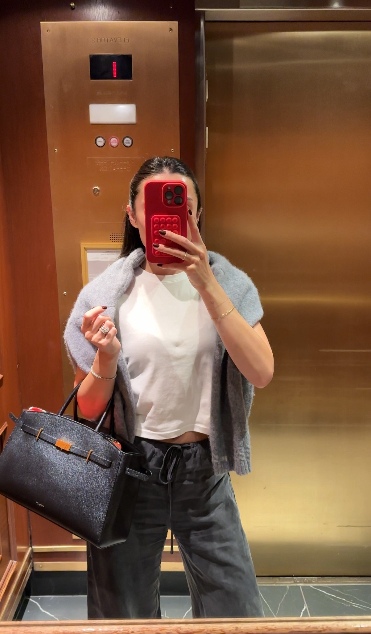 My everyday bag that holds everything!! And my go to baby tee. Pants are old Princess Polly and the sweater is last season Sezane.

#LTKItBag #LTKStyleTip #LTKFindsUnder50