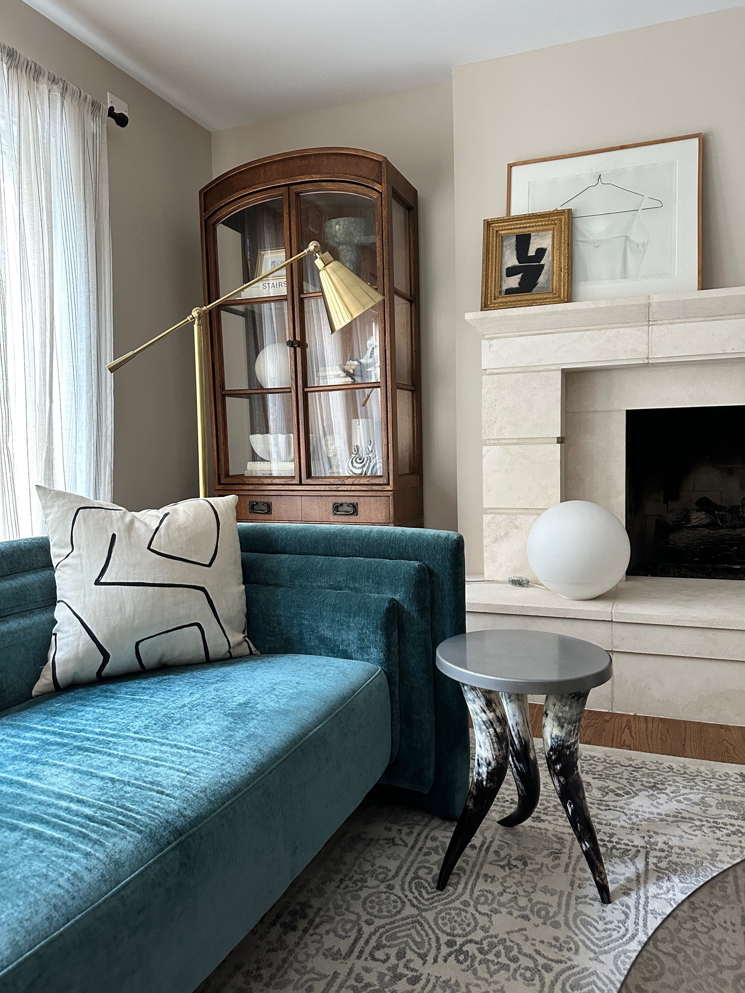 Weird, funky furniture? Unique, eclectic living room? Sprinkle in some vintage decor? It’s the only way I decorate. 

Photo of modern eclectic living room with tradition vintage style rug in shades of blue, teal couch, Kelly Wearstler Graffito pillows, vintage Hickory arched cabinet, brass flor lamp, vintage horn table, round globe lamp by Artemide, and affordable linen curtains. 

#LTKSaleAlert #LTKFallSale #LTKHome