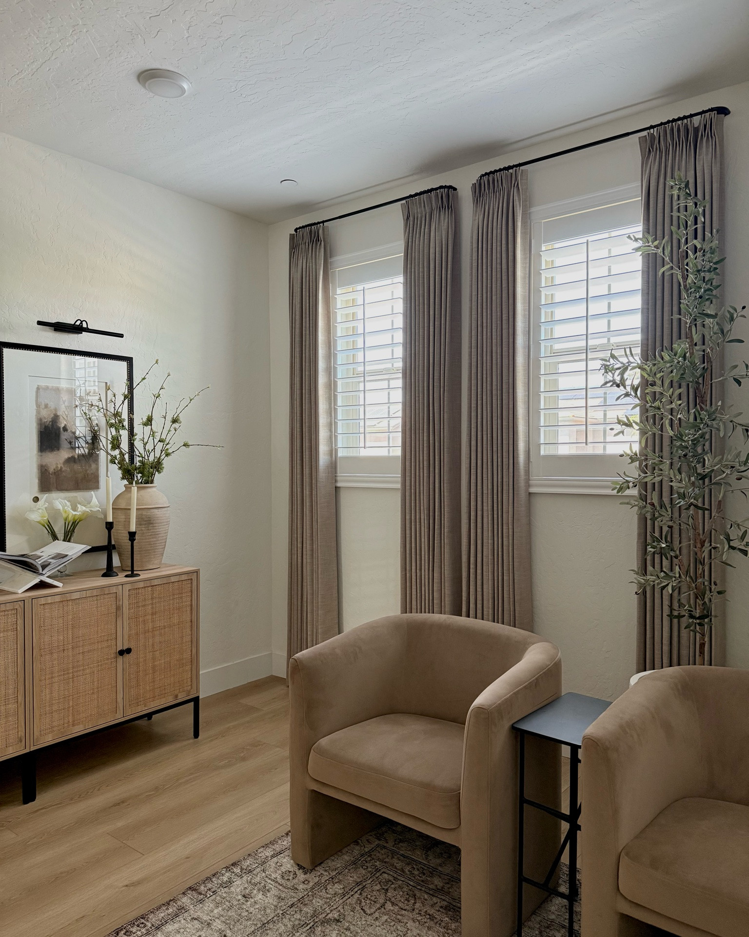 My favorite curtains and ones I recommend to everyone. They completely warmed up this room. 

Curtain details:

Liz Linen Drape Pinch Pleat
Grey Beige 1908-6
Width 52in, Length 102in (9ft ceilings)
Unlined 
Memory Shaped

#LTKHome