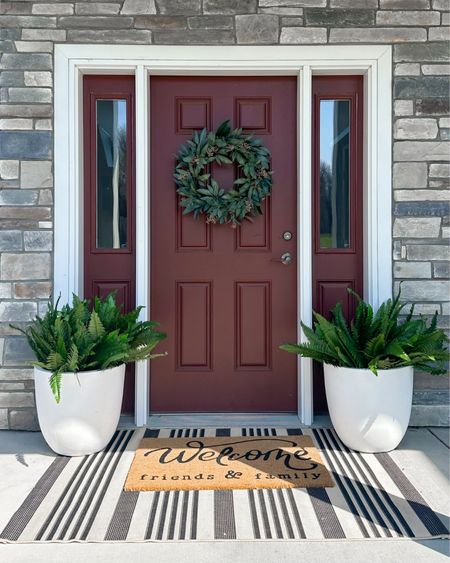 Front porch decor, including this striped layered mat, white pots, artificial ferns, and a wreath for the door.

Porch inspiration, porch decor, front door decor, amazon home

#LTKhome #LTKfindsunder50 #LTKstyletip