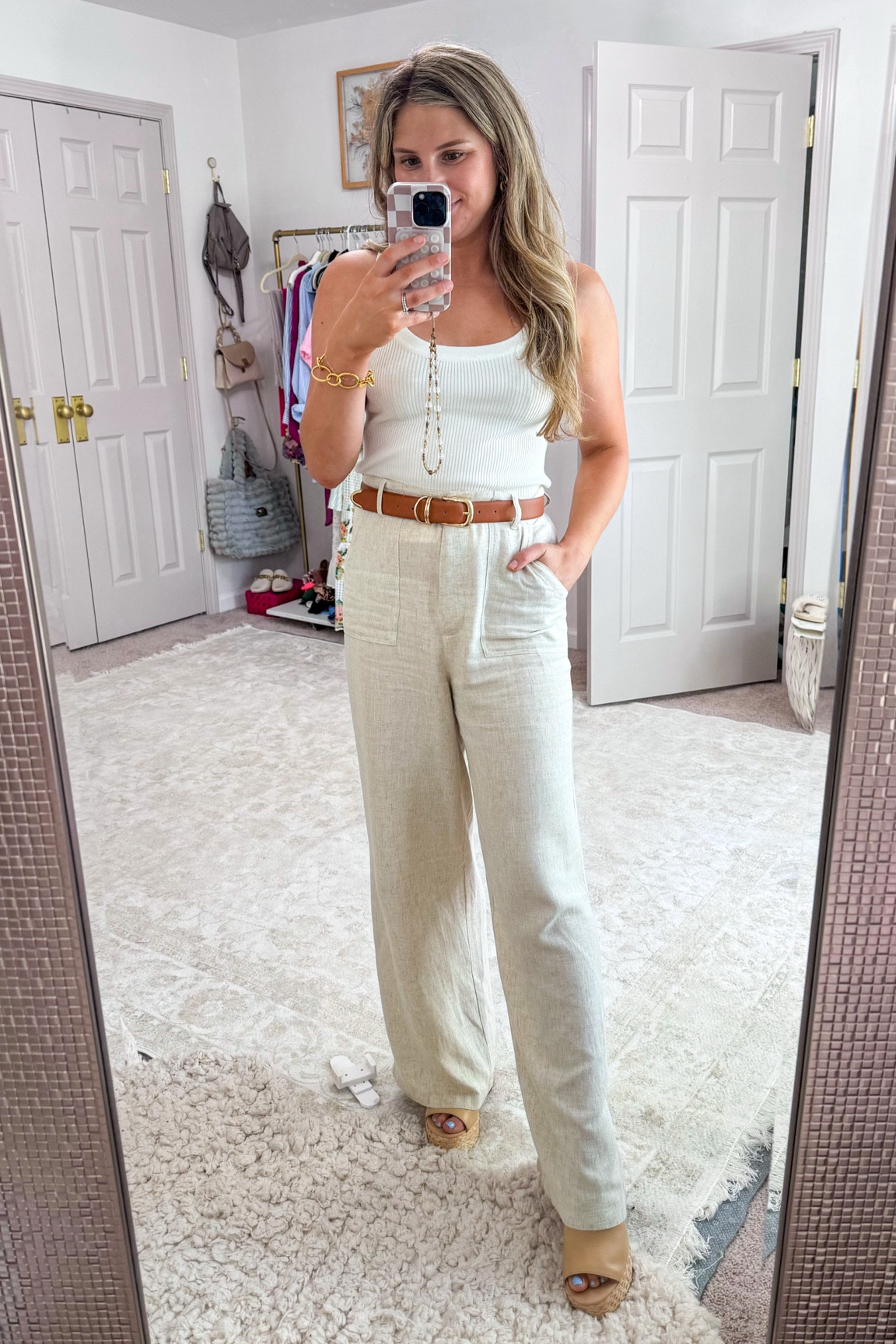 Linen pants outfit 
Beige linen pants high waisted 
Tan belt leather Amazon 
White sweater tank great basic neutral outfit 

#LTKFindsUnder50 #LTKStyleTip #LTKFindsUnder100