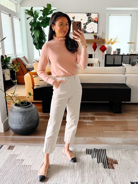 Winter work outfit with a ruffle neck merino wool sweater and straight leg pants. Pairing with captoe flats for a business casual workwear look. Wearing size XXS in the sweater and 00 in the pants. Shoes fit true to size  

#LTKworkwear #LTKstyletip