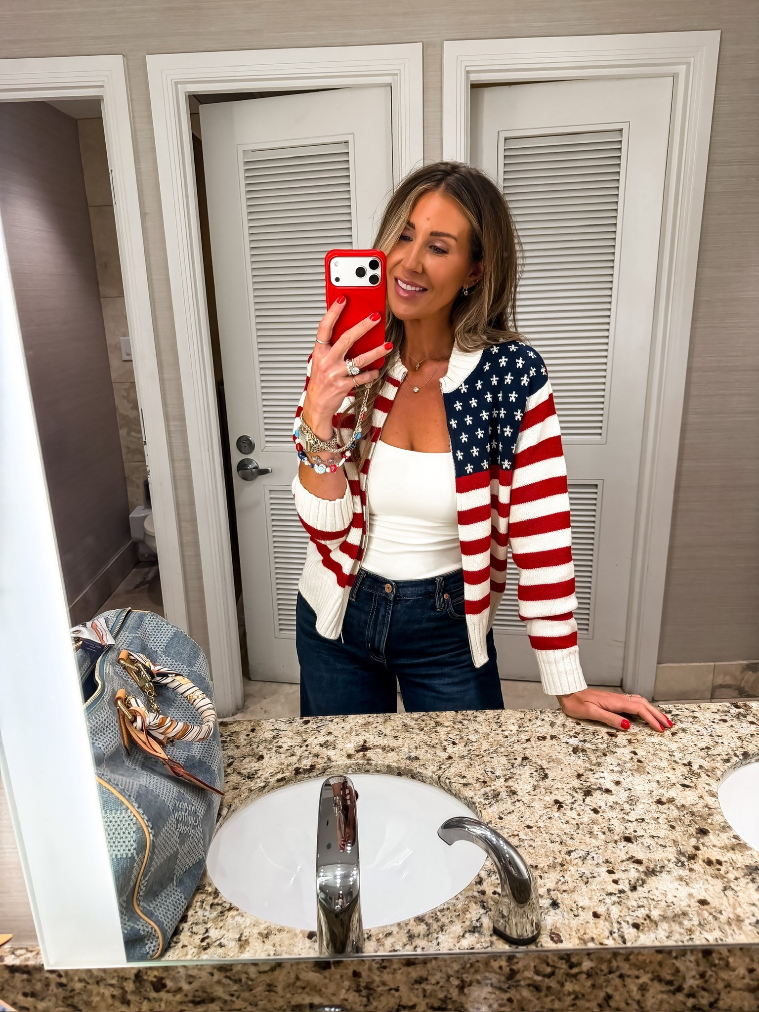 This American flag cardigan is such a fun piece for summer holidays and beyond! I paired it with a simple white tank and dark denim for an easy patriotic outfit that’s classic, comfortable, and one I’ll wear year after year.

American flag cardigan, patriotic outfit, Fourth of July outfit, USA sweater, summer cardigan, white tank, dark wash jeans, holiday outfit, casual summer style, Americana fashion, themominstyle

#LTKootd #LTKSeasonal #LTKOver40