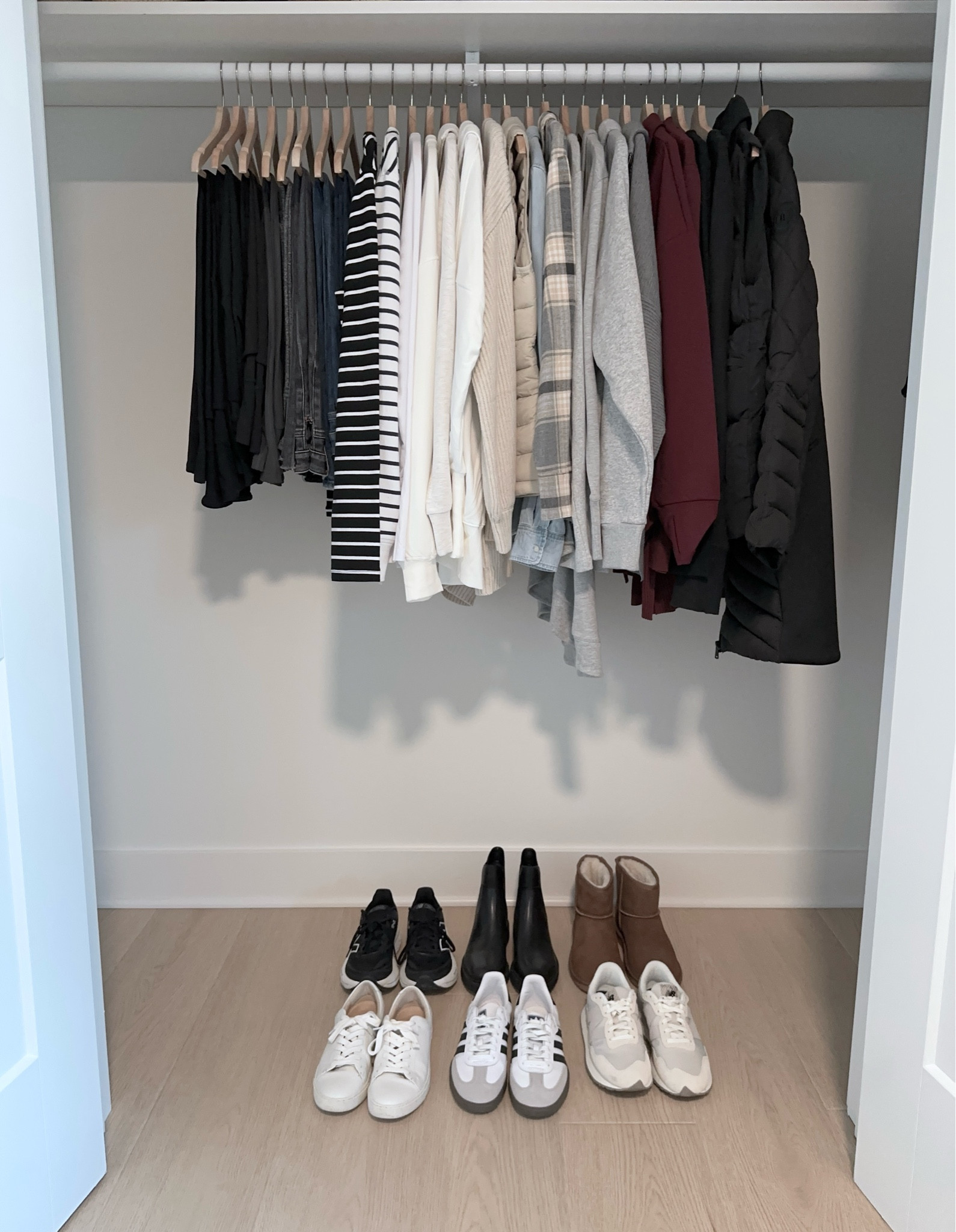 My 34-piece Cozy Casual Winter 2024 Capsule Wardrobe 🍁The colors are black, gray, white, ecru, blue and burgundy.  I wear styles that are simple and minimal for a moderate winter clomate. ✔️ You can use this capsule wardrobe in your closet and use part of it as a travel wardrobe!

Athleisure, jeans, joggers, flare leggings, half zip pullover, quarter zip sweater, tee, zip hoodie, sweatshirt, stripe tee, chambray shirt, flannel plaid shirt, cardigan, puffer vest, coat, sneakers, log sole boots, Ugg boots
