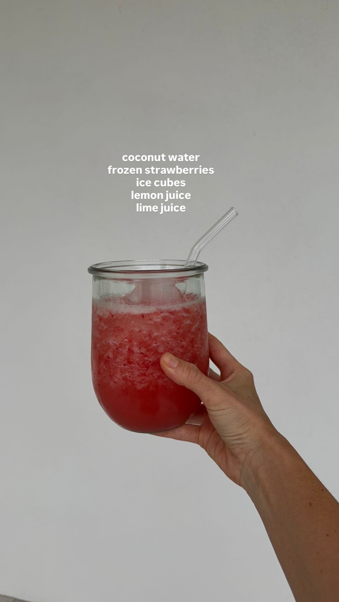 coconut water 
frozen strawberries 
ice cubes 
lemon juice 
lime juice

In my favorite glass cup! 🍓

#LTKdayinmylife #LTKfoodie #LTKHome