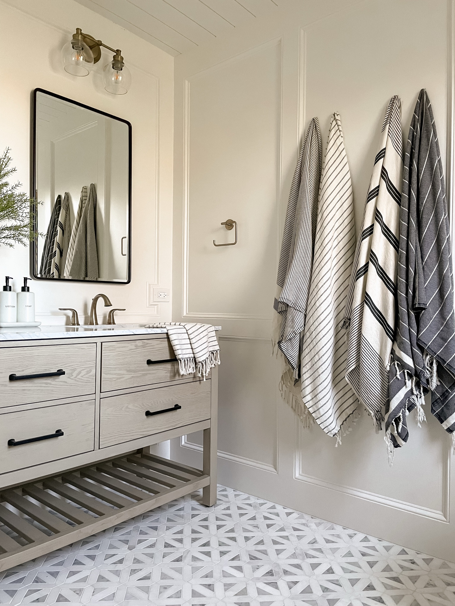 Neutral bathroom decor. Turkish towels. Marble tile. Double vanity. Drawer pulls. Cabinet hardware. Recessed medicine cabinets. Bathroom mirror  

#LTKHome