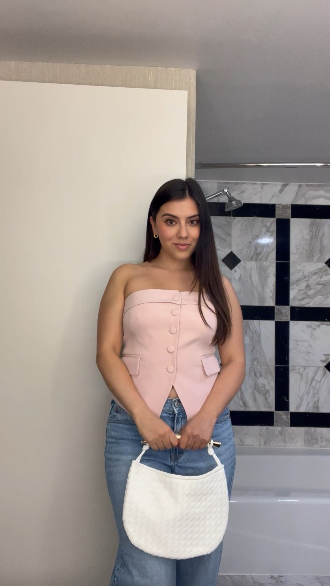 Spring style is in full bloom with this chic blush pink strapless button-up top paired with high-waisted straight leg jeans—such a flattering combo. I styled it with clear nude heeled sandals and a textured white mini bag for a clean, feminine look. This easy daytime outfit is perfect for weekend brunch or casual outings and gives major neutral, polished vibes.

#LTKSeasonal