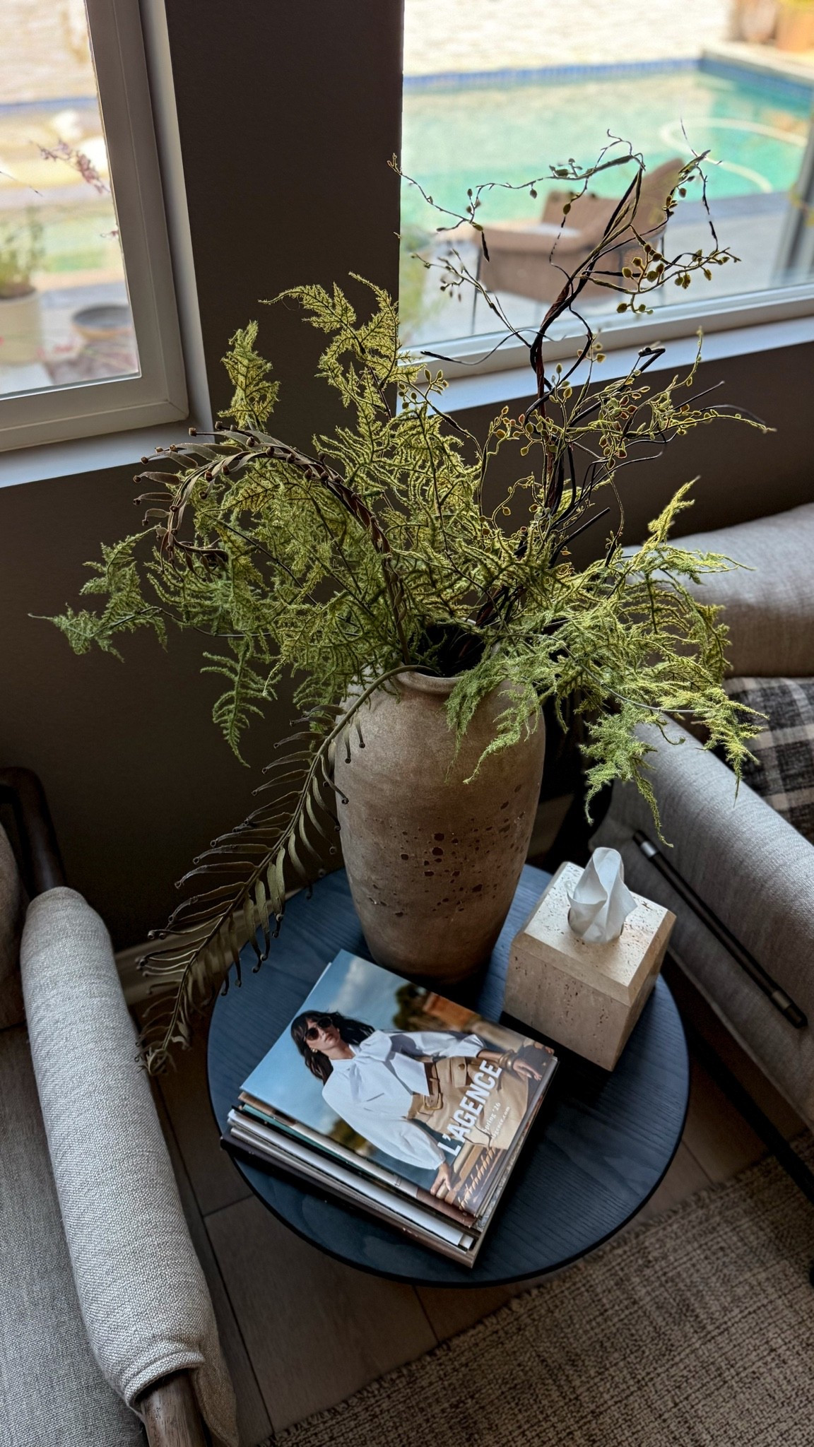 I love styling this little corner with a stack of magazines and a big plant. This side table makes the space feel so cozy!

#LTKHome #LTKSeasonal