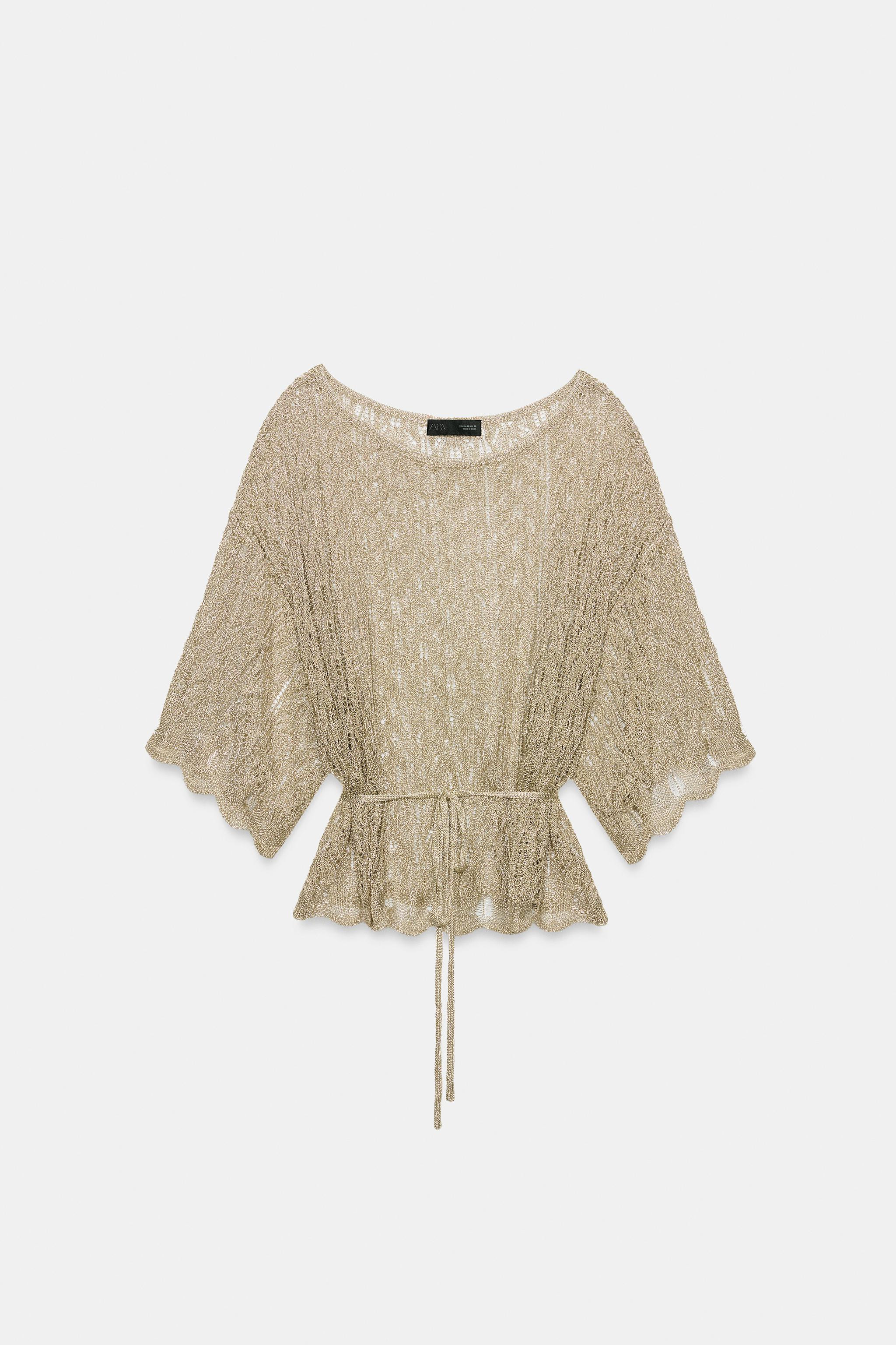 Open-knit top with metallic thread. Boat neck and below-the-elbow sleeves. Fine belt detail. | Zara US