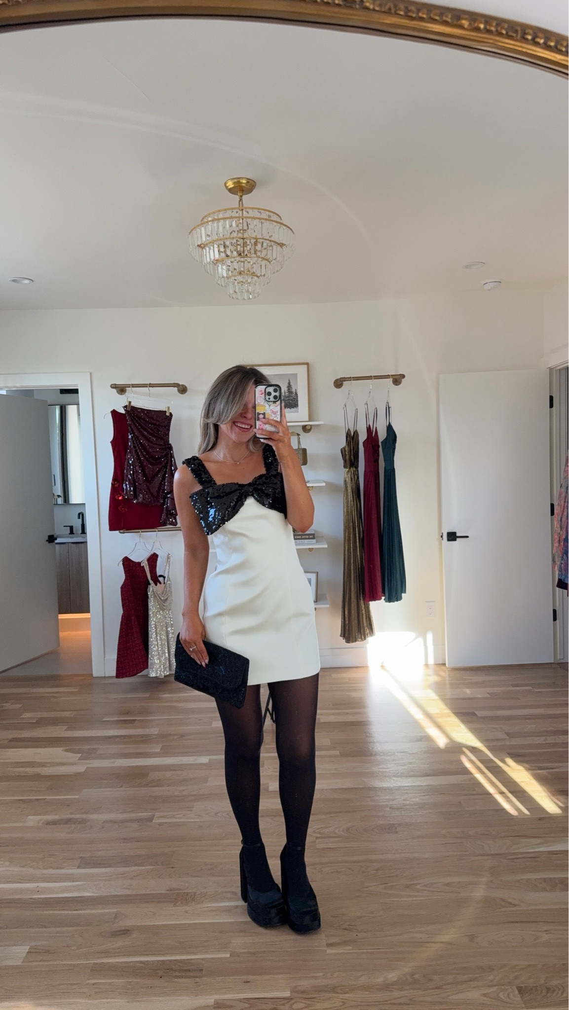 Black sequin bow white mini dress wedding guest cocktail dress special occasion dress

Wearing my usual small

Avara code: emerson15
Divi code: Emerson 

#LTKFindsUnder50 #LTKParties #LTKWedding