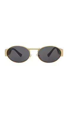VERSACE Oval Sunglasses in Gold & Dark Grey from Revolve.com | Revolve Clothing (Global)