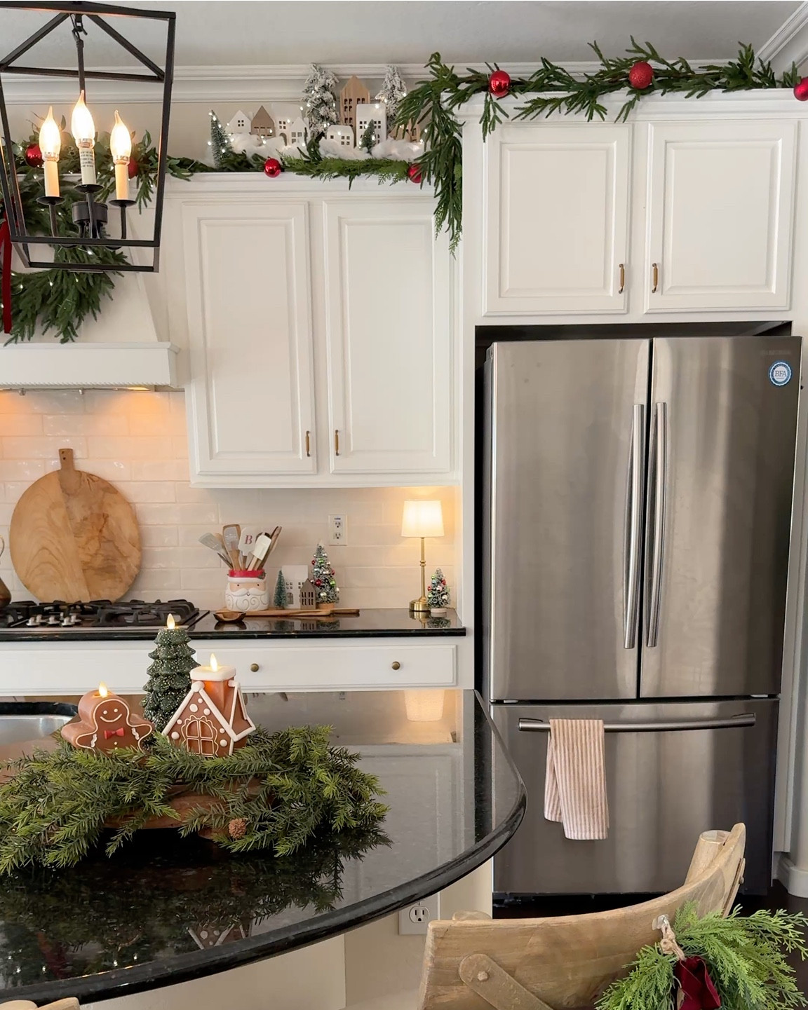 Christmas Kitchen garlands, wreath and similar houses. 

Gingerbread candles are from Luminara. Use code JOYFULDECOR10 for 10% off your order.

#LTKHome #LTKSeasonal #LTKHoliday