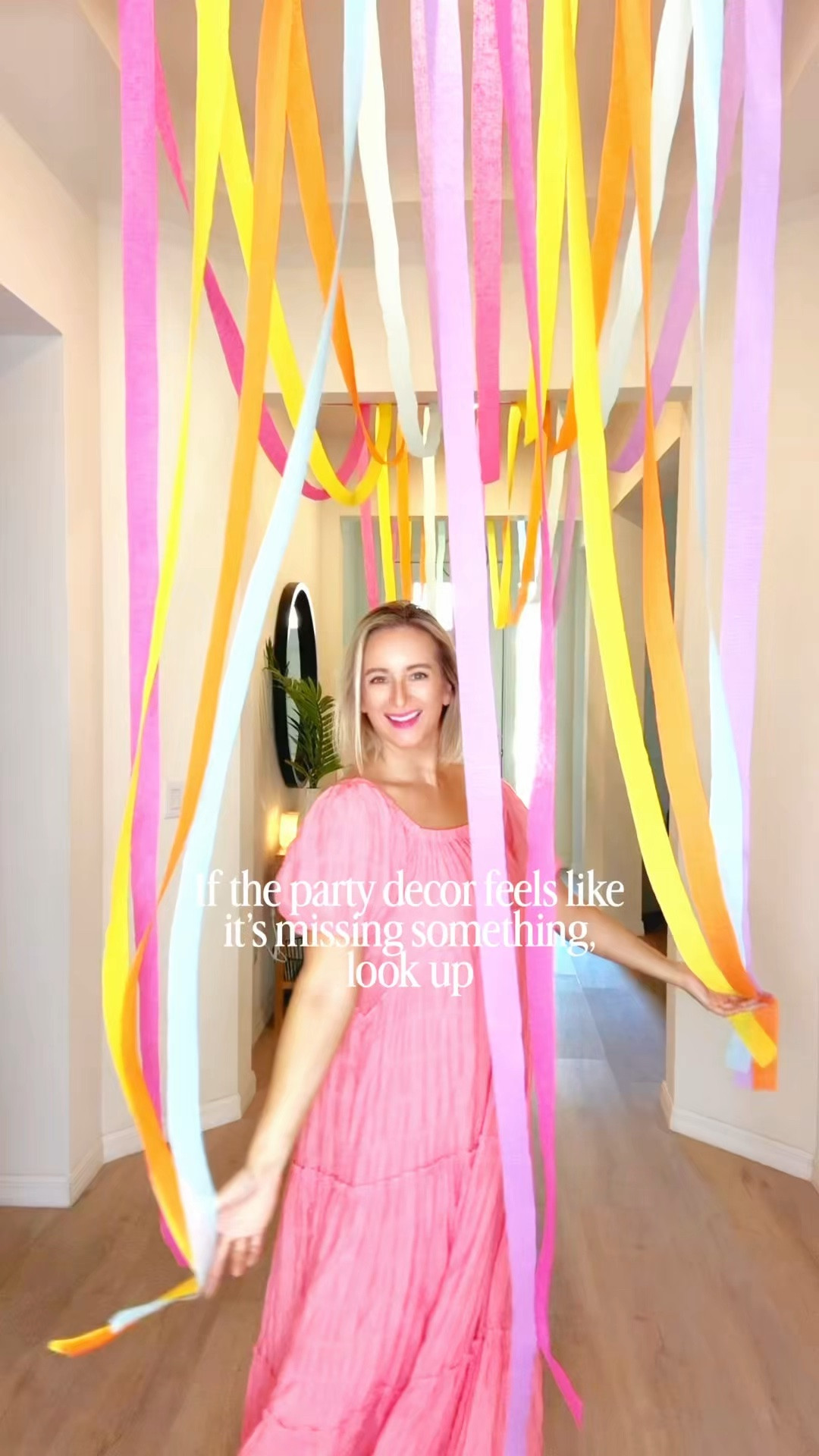 Ceiling streamers! So easy and make such a big impact! I used pink painters tape to hang!