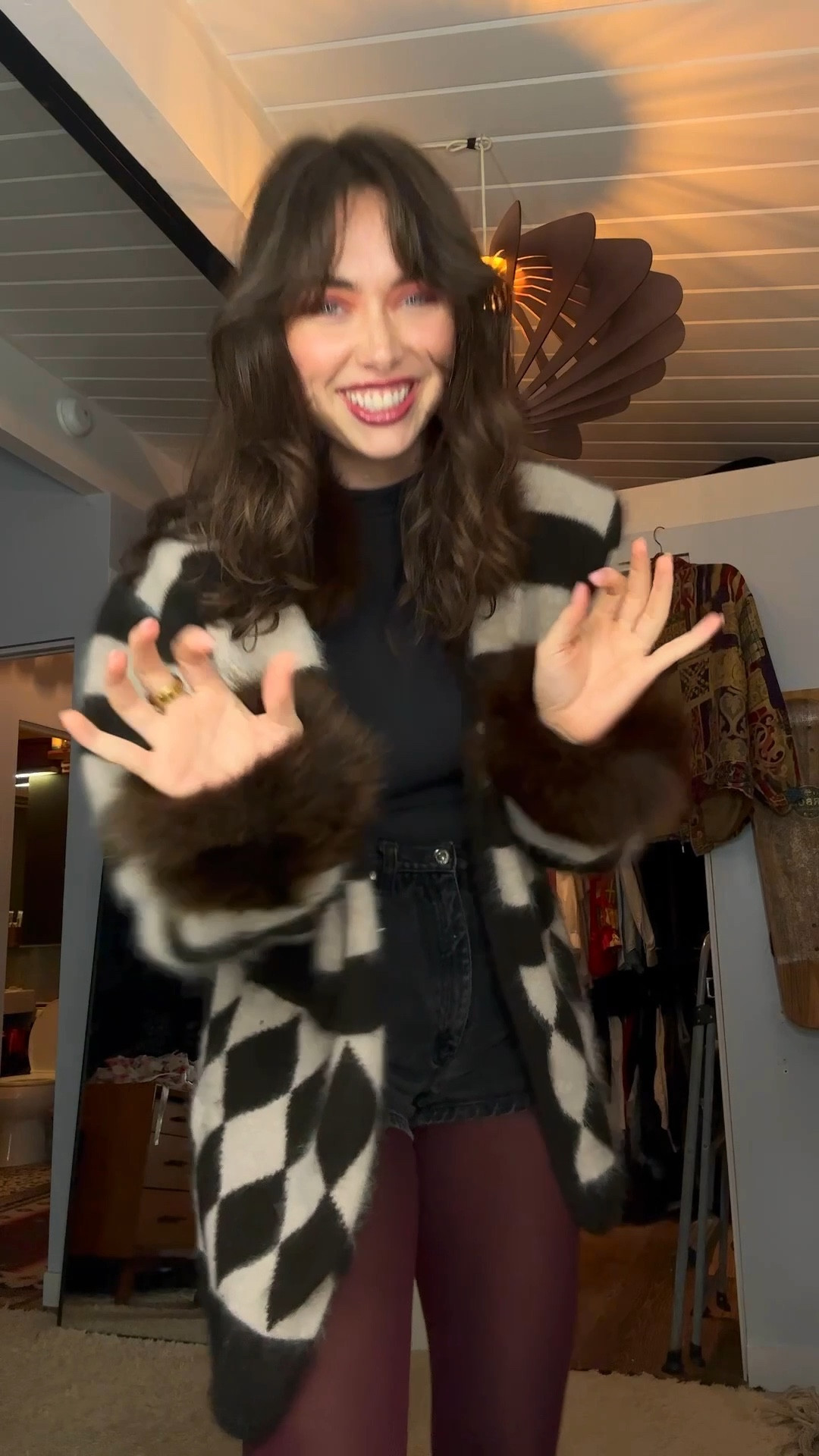 GRWM for a holiday party 🎉 I threw this outfit together quickly, opting for burgundy tights that I matched to my lip color. Then kept it simple with denim shorts and a skims long sleeve and added fun with the crazy naked wolfe boots and vintage cache sweater 

#LTKHoliday #LTKSeasonal #LTKgrwm