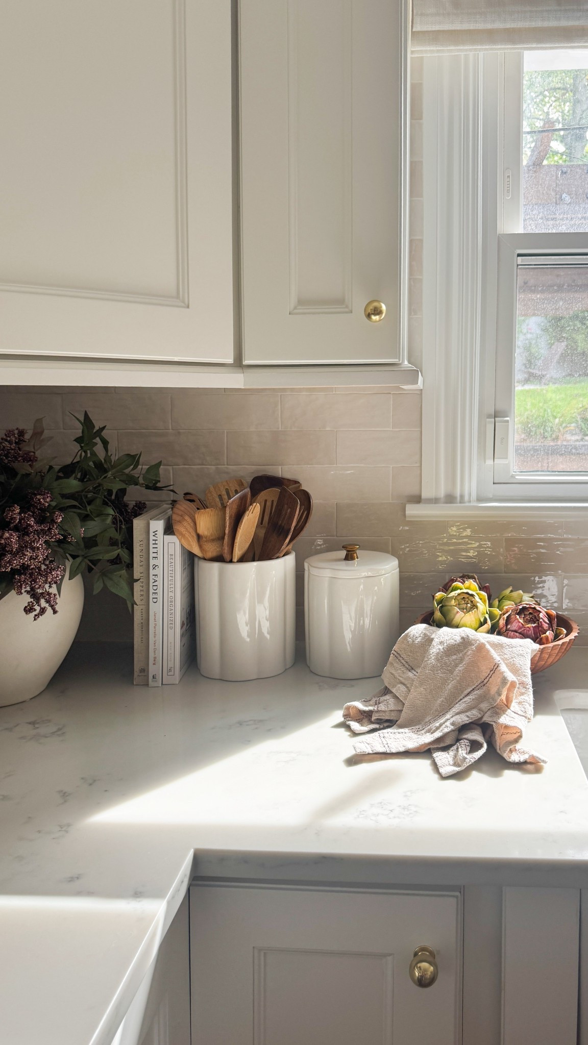 ✨ Little details make the biggest difference ✨
This corner of our kitchen has been feeling extra cozy lately with a few simple finds I’m loving:

▫️ White canisters + 2 wood bowl (Target)
▫️ Wooden spoons + Faux artichokes + florals for texture (Amazon)

I love how layering these pieces keeps the space practical but still so elevated. Perfect mix of form + function 🤍



#KitchenStyling #CozyHomeVibes #TargetStyle #AmazonHome #ModernOrganicHome


#LTKSeasonal #LTKHome #LTKFindsUnder50