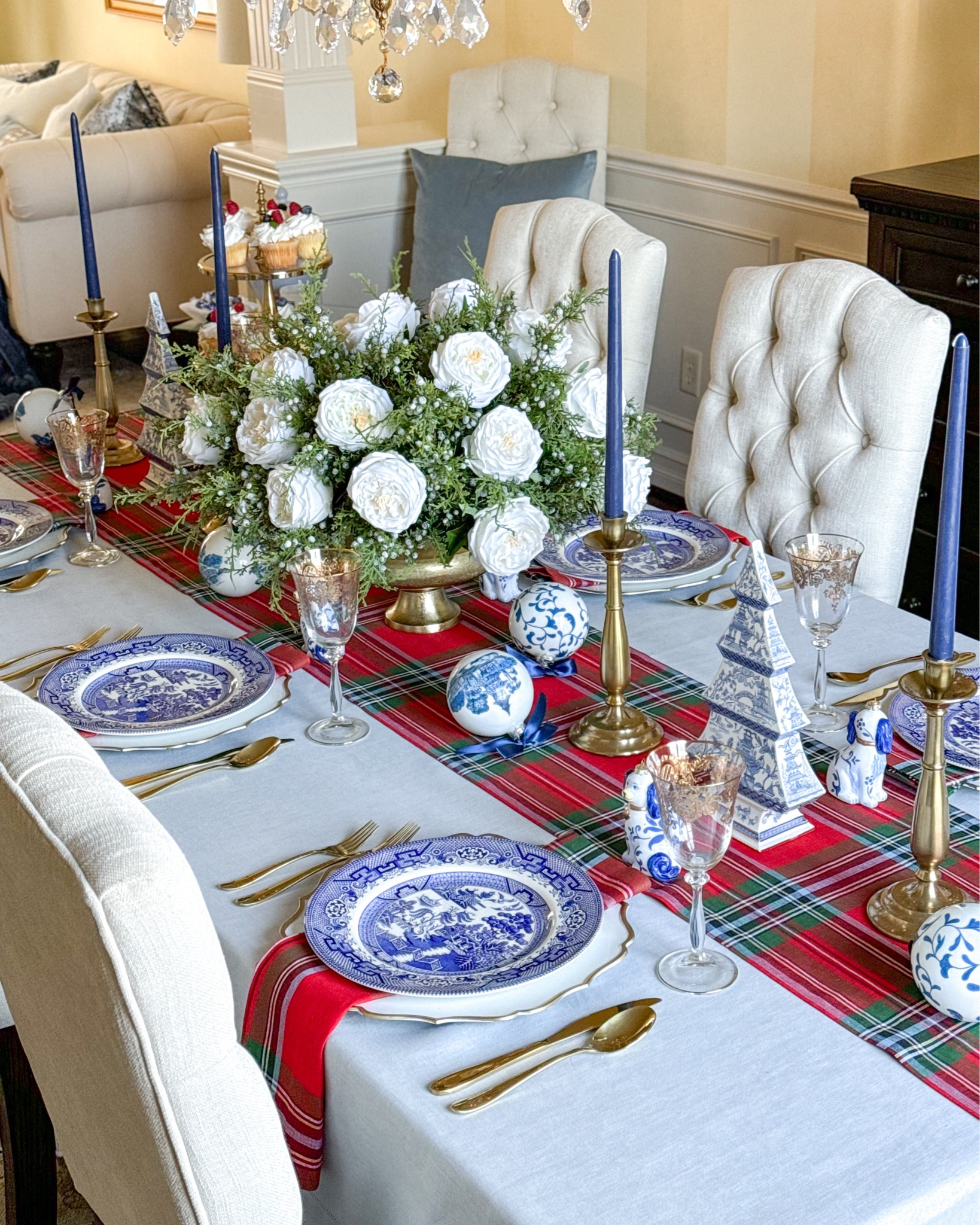 Shop my red and blue Christmas Tablescape!

Holiday table, tartan plaid, Christmas linens, Christmas decor, Christmas centerpiece, blue willow china, gold candleholders, blue and white decor, chinoiserie tree, ceramic tree, chinoiserie ornaments, traditional Christmas, Staffordshire dogs 

#LTKSeasonal #LTKHoliday #LTKHome