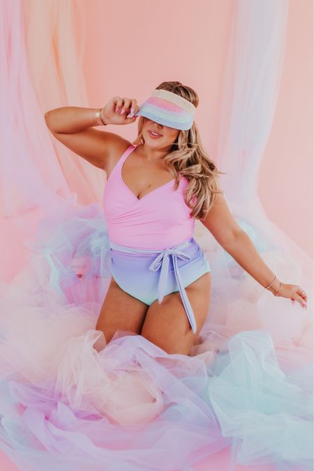 the Sarah Wrap one piece swimsuit in Cotton Candy Ombré! wearing size xl. size UP, this suit is running small. linking rainbow visor! 

#LTKswim #LTKcurves #LTKSeasonal