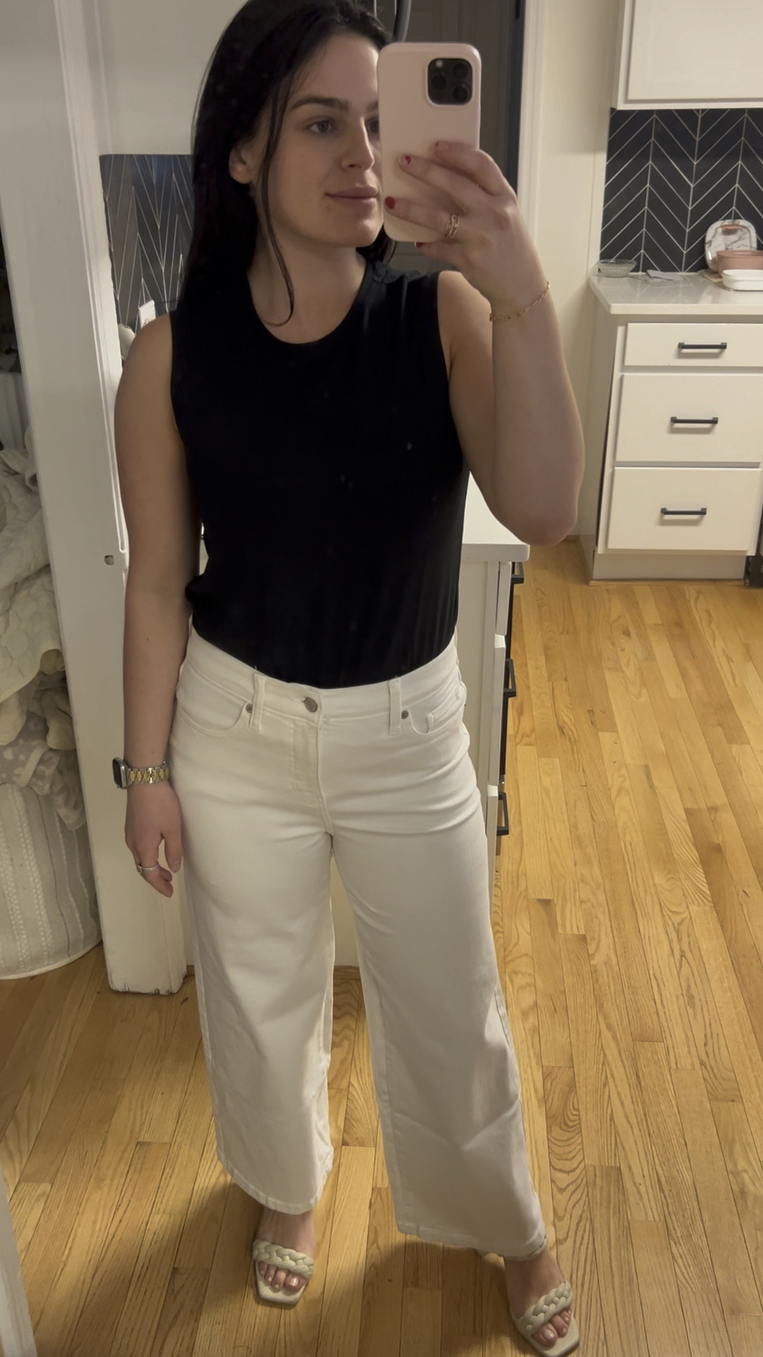 Black tank perfect to pair with a blazer or sweater for the office or church! White high waisted wide leg jeans and white heeled sandals

#LTKSeasonal #LTKworkwear #LTKSpringSale